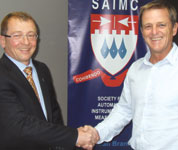 Branch chairman Howard Lister thanks C&#233;dric Jeanneret (left) after the presentation.